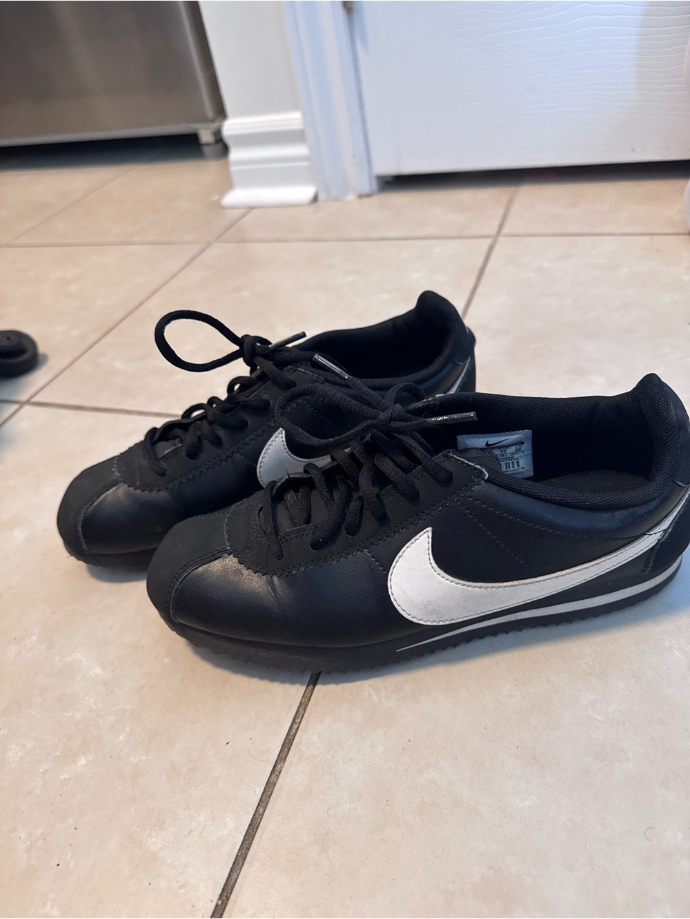 Nike Cortez Black Sneakers with White Swoosh